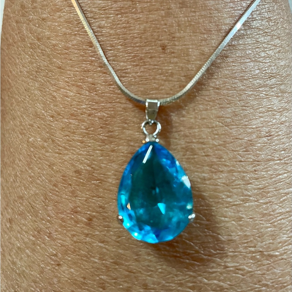 4.5 Carat Blue Topaz pendant with 17.5 inch sterling silver chain.